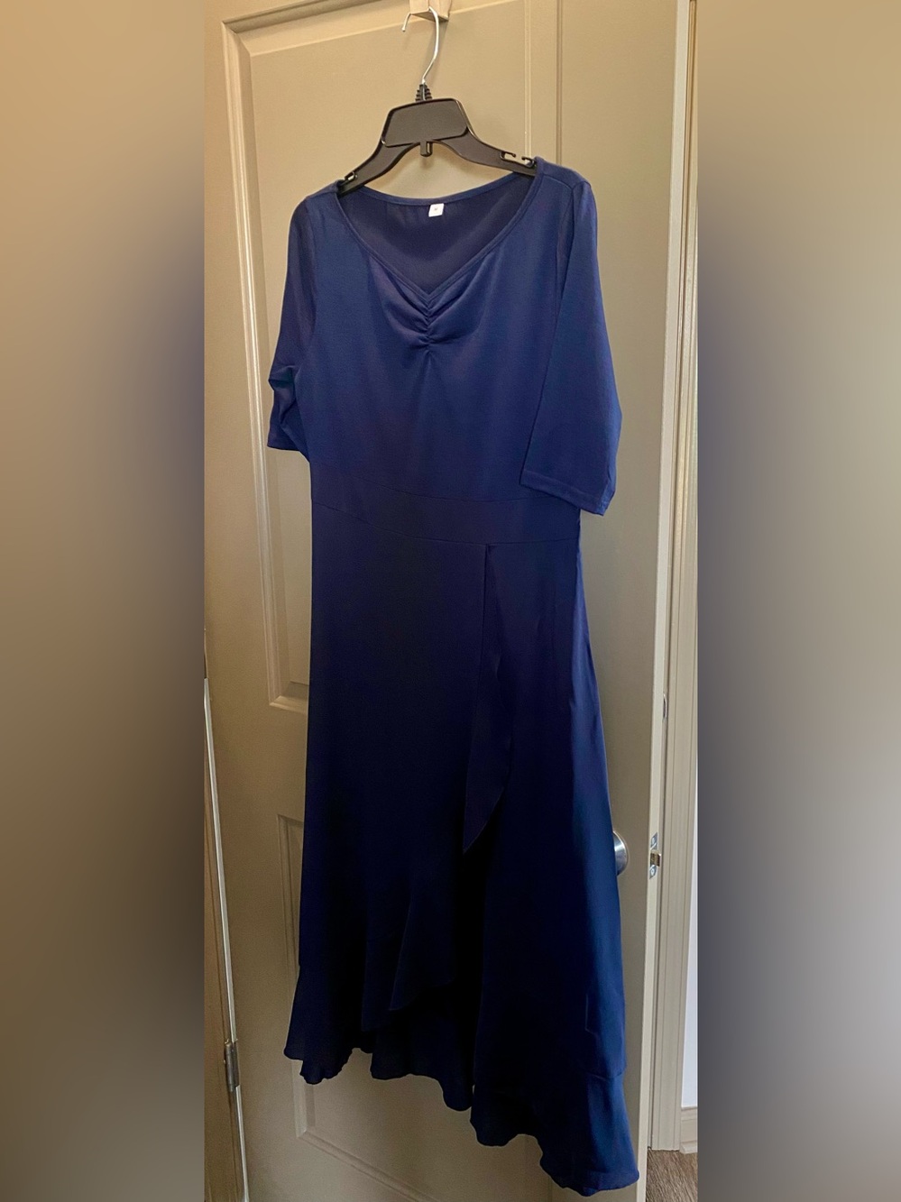 Navy blue high/low romantic dress with sleeves. Never worn except try on.